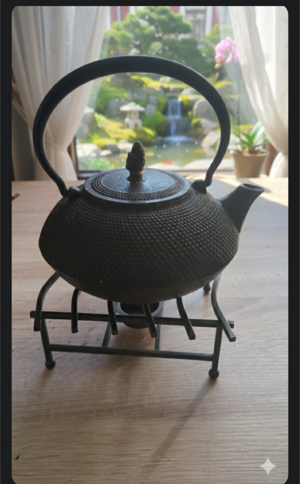 Teekanne mit Stövchen